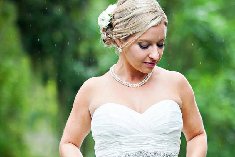 Blair Lindsey in wedding dress in the rain