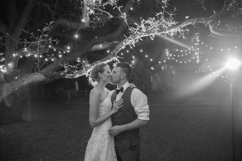 Noah Harris and Julie Finnell Harris wedding photo under the stars black and white