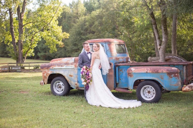 Noah Harris and Julie Finnell Harris wedding photo at The Corry House old truck prop
